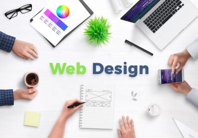 web-design-text-work-desk-surrounded-with-web-development-team-devices-projects-ideas-paper-concept-team-meeting_176814-958-1