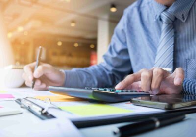 business-finance-man-calculating-budget-numbers-invoices-financial-adviser-working-2