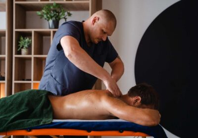 side-view-man-getting-professional-massage-1