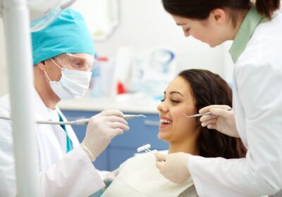 dentist-examining-patient-s-teet